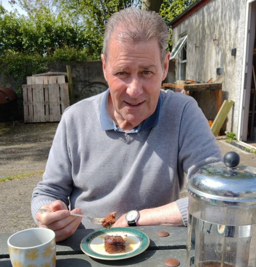 Man eating pudding